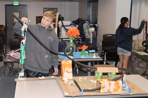  EMS eighth-graders' foam roller coasters filled the library with creativity